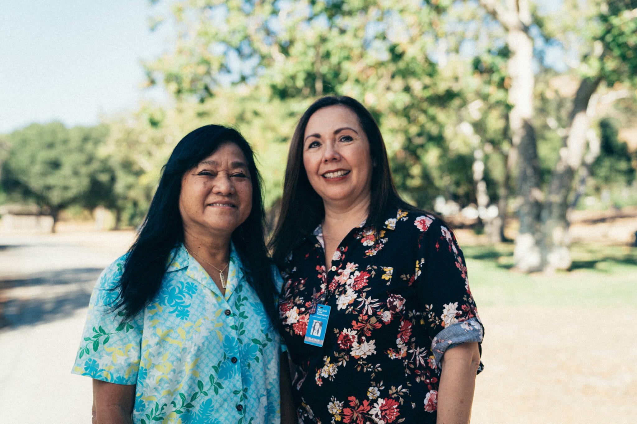 smiling nurse and female patient nurse and her patient