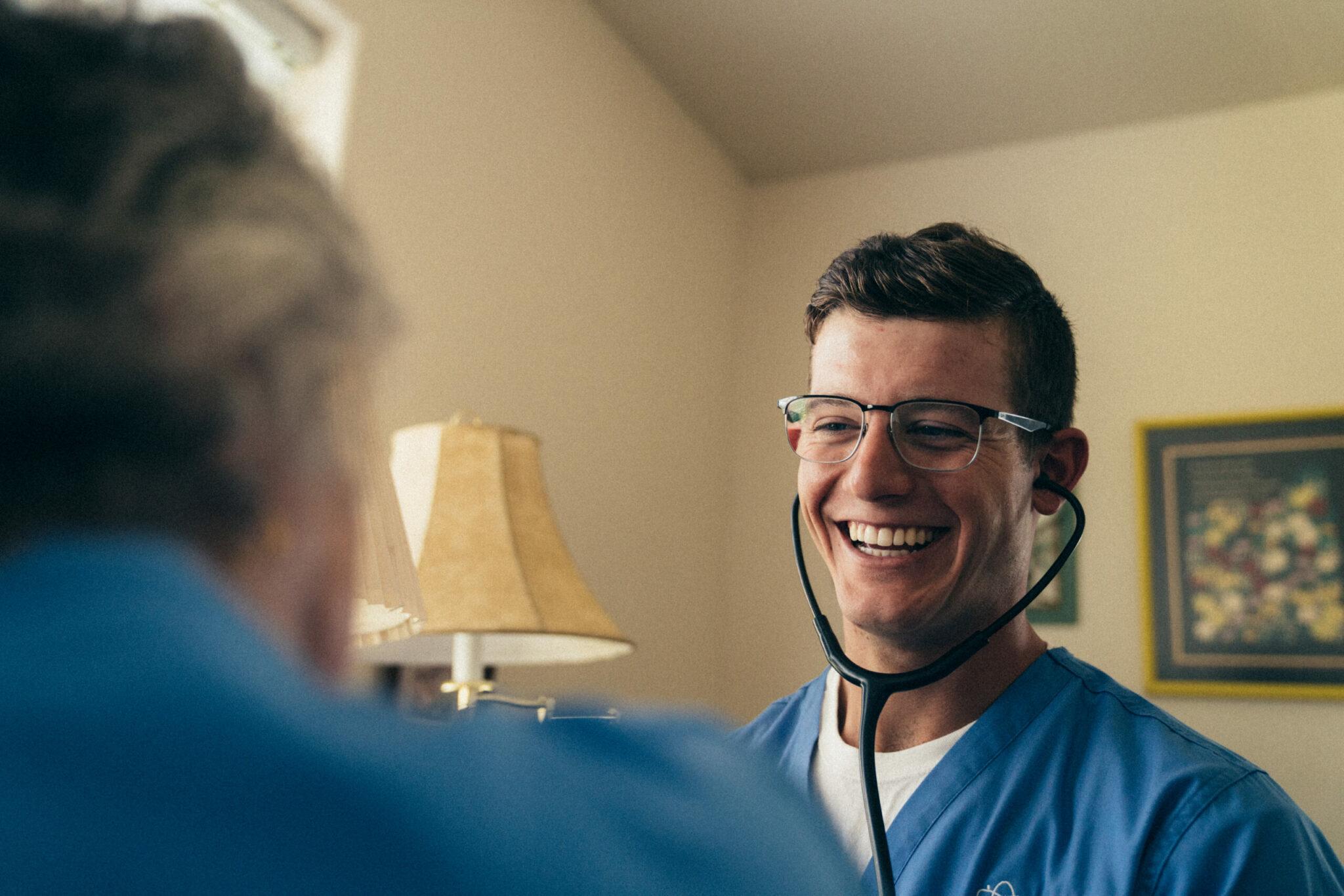 happy male nurse young nurse smiling